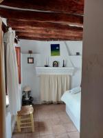 A bed or beds in a room at Casa Balcón