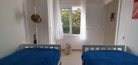 A bed or beds in a room at Las Golondrinas - RISSAGA