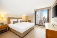Postel nebo postele na pokoji v ubytování Tzl Suites Hotel Nişantaşı