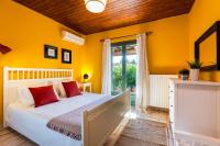 A bed or beds in a room at Villa Elli