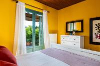 A bed or beds in a room at Villa Elli