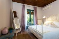 A bed or beds in a room at Villa Elli