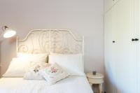 A bed or beds in a room at Villa Elli