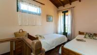 A bed or beds in a room at Villa Elli