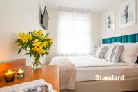 Posteľ alebo postele v izbe v ubytovaní Hotel Awo