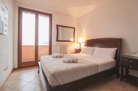 Posteľ alebo postele v izbe v ubytovaní Villa Serena