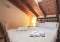 Posteľ alebo postele v izbe v ubytovaní Villa Serena