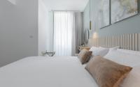Nathan's Suites On The Beachにあるベッド