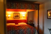 Schloss Auel Boutique Hotel & Design Golf Lodgeにあるベッド