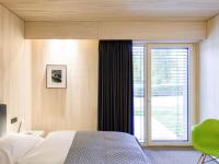 Schloss Auel Boutique Hotel & Design Golf Lodgeにあるベッド