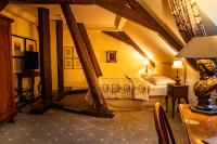 Schloss Auel Boutique Hotel & Design Golf Lodgeにあるベッド
