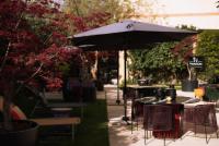A garden outside Vmaison Brera Milano