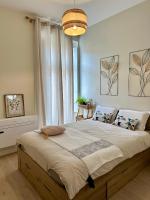 Posteľ alebo postele v izbe v ubytovaní Coural’ Home
