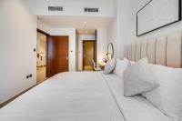 Postel nebo postele na pokoji v ubytování Amazing 1 BD in Marina Gate 2 Dubai Marina