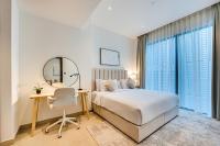 Postel nebo postele na pokoji v ubytování Amazing 1 BD in Marina Gate 2 Dubai Marina