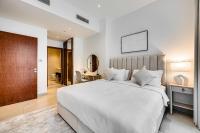 Postel nebo postele na pokoji v ubytování Amazing 1 BD in Marina Gate 2 Dubai Marina