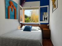 Posteľ alebo postele v izbe v ubytovaní Apartamento con jardín a 11 metros de la playa. B1.