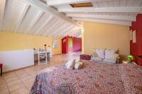 Łóżko lub łóżka w pokoju w obiekcie Villa La Dolce Vita - Happy Rentals