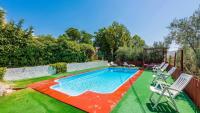 The swimming pool at or close to Molino Los Justos - Casa Vieja- Algarinejo by Ruralidays