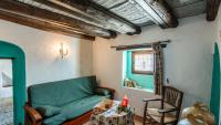 A seating area at Molino Los Justos - Casa Vieja- Algarinejo by Ruralidays