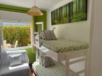 Posteľ alebo postele v izbe v ubytovaní Apartamento con jardín a 11 metros de la playa. B1.
