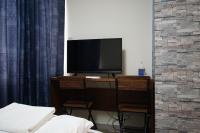 TOKYOGUEST日本橋にあるテレビまたはエンターテインメントセンター