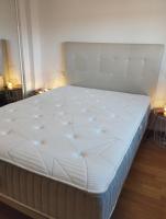 Łóżko lub łóżka w pokoju w obiekcie My Suites Madrid - Aeropuerto Ifema