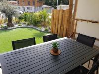 Vonkajšia záhrada v ubytovaní Dune Blanche 300 m de l'Océan, appartement neuf 6 personnes