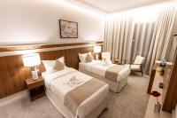 Wassad Hotel Makkah فندق وسد مكةにあるベッド