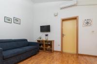 Televízia a/alebo spoločenská miestnosť v ubytovaní Apartments by the sea Podaca, Makarska - 13189