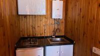 Kuchyň nebo kuchyňský kout v ubytování Camping de Cervera de Buitrago