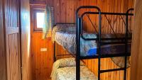 Postel nebo postele na pokoji v ubytování Camping de Cervera de Buitrago