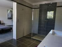 a bathroom with a shower with a glass door at Magnificent Villa in Saint Ambroix with Private Pool in Saint-Ambroix