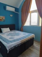 A bed or beds in a room at Arte Casa