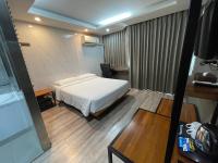 Postel nebo postele na pokoji v ubytování Bangkok City Link Hotel