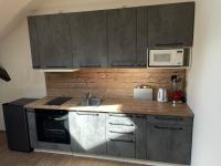 Kuchyň nebo kuchyňský kout v ubytování Apartmán pod Kňeží Horou