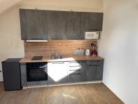Kuchyň nebo kuchyňský kout v ubytování Apartmán pod Kňeží Horou