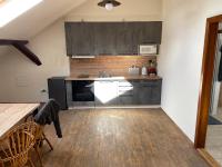Kuchyň nebo kuchyňský kout v ubytování Apartmán pod Kňeží Horou