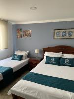 Hotel Boutique Casa Magalyにあるベッド