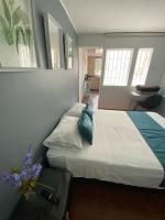 Hotel Boutique Casa Magalyにあるベッド