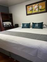Hotel Boutique Casa Magalyにあるベッド