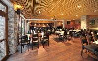 Reštaurácia alebo iné gastronomické zariadenie v ubytovaní Via Jasna Wellness Apartments