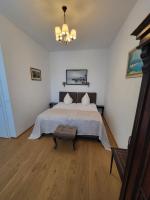 Posteľ alebo postele v izbe v ubytovaní Villa Musik - Historical apartments in Baden