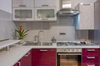 Kuchyň nebo kuchyňský kout v ubytování Apartments Suki