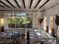 Reštaurácia alebo iné gastronomické zariadenie v ubytovaní Casa única con jardín a 45 metros de la playa. BE