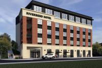 eine Darstellung des neuen renovierten Hotelgebäudes in der Unterkunft Riverbend Hotel and Suites, Trademark Collection by Wyndham in Ashtabula