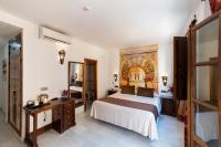 Posteľ alebo postele v izbe v ubytovaní Hotel Casa Museo de la Mezquita