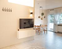 Televízia a/alebo spoločenská miestnosť v ubytovaní Apartment Alex