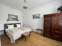 Posteľ alebo postele v izbe v ubytovaní Villa Musik - Historical apartments in Baden