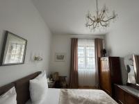 Posteľ alebo postele v izbe v ubytovaní Villa Musik - Historical apartments in Baden